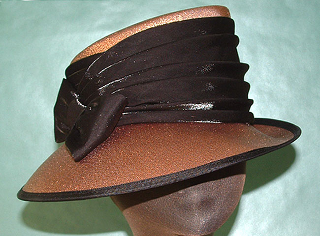 hat covered in shiny lamé with shimmer taffeta